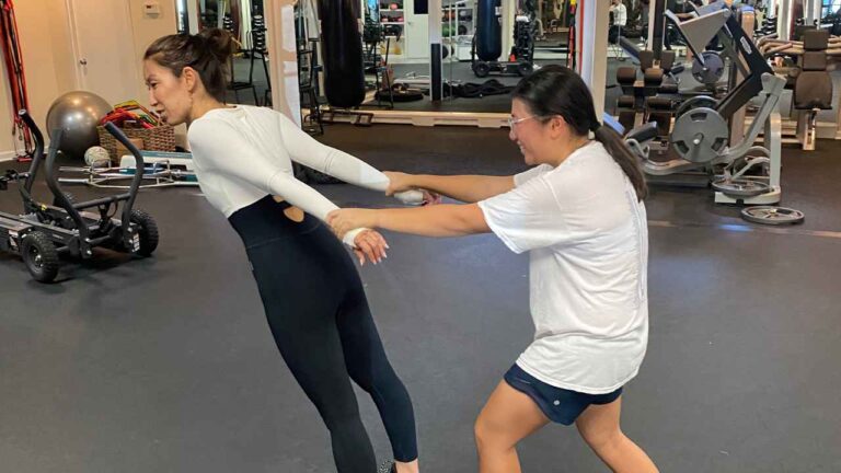 What Is Personal Training - A female training is personally coaching a female training with Mark's Guidance